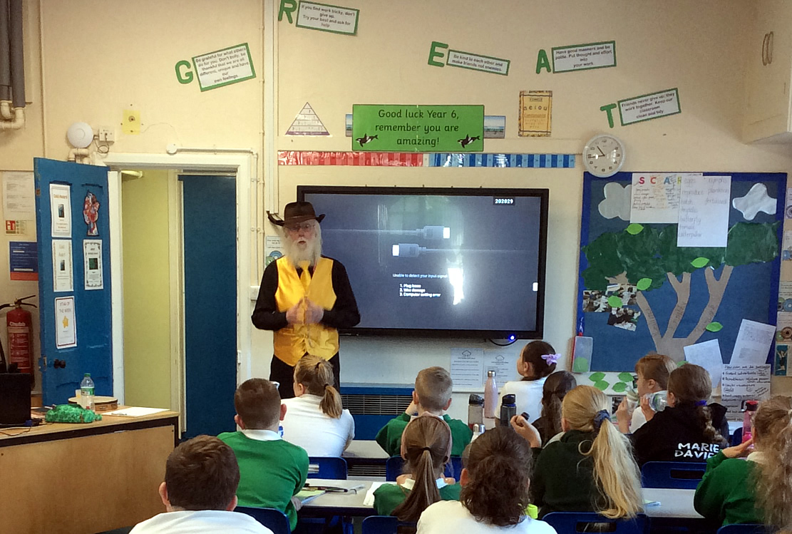 Keith Butters storytelling in Great Steeping Primary School